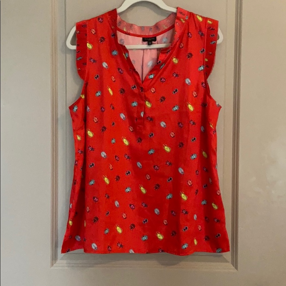 Red-orange sleeveless top